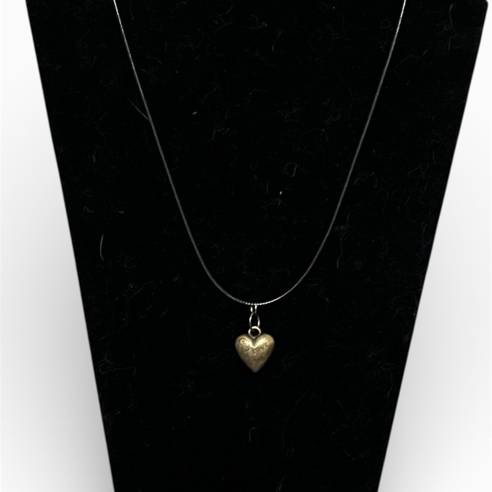 Gold Tone Heart Pendant On Leather Cord
